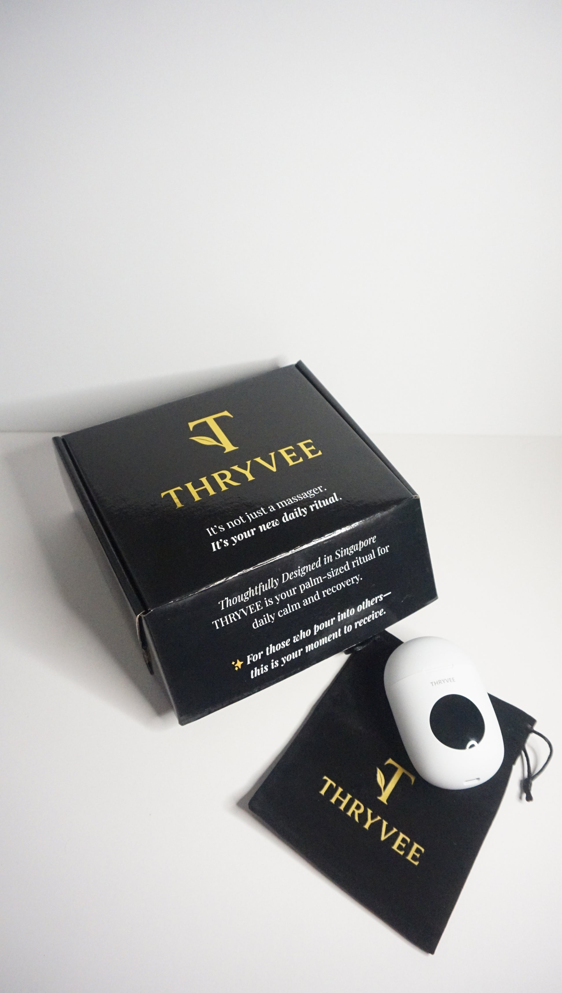 Close-up of Thryvee rechargeable portable massager